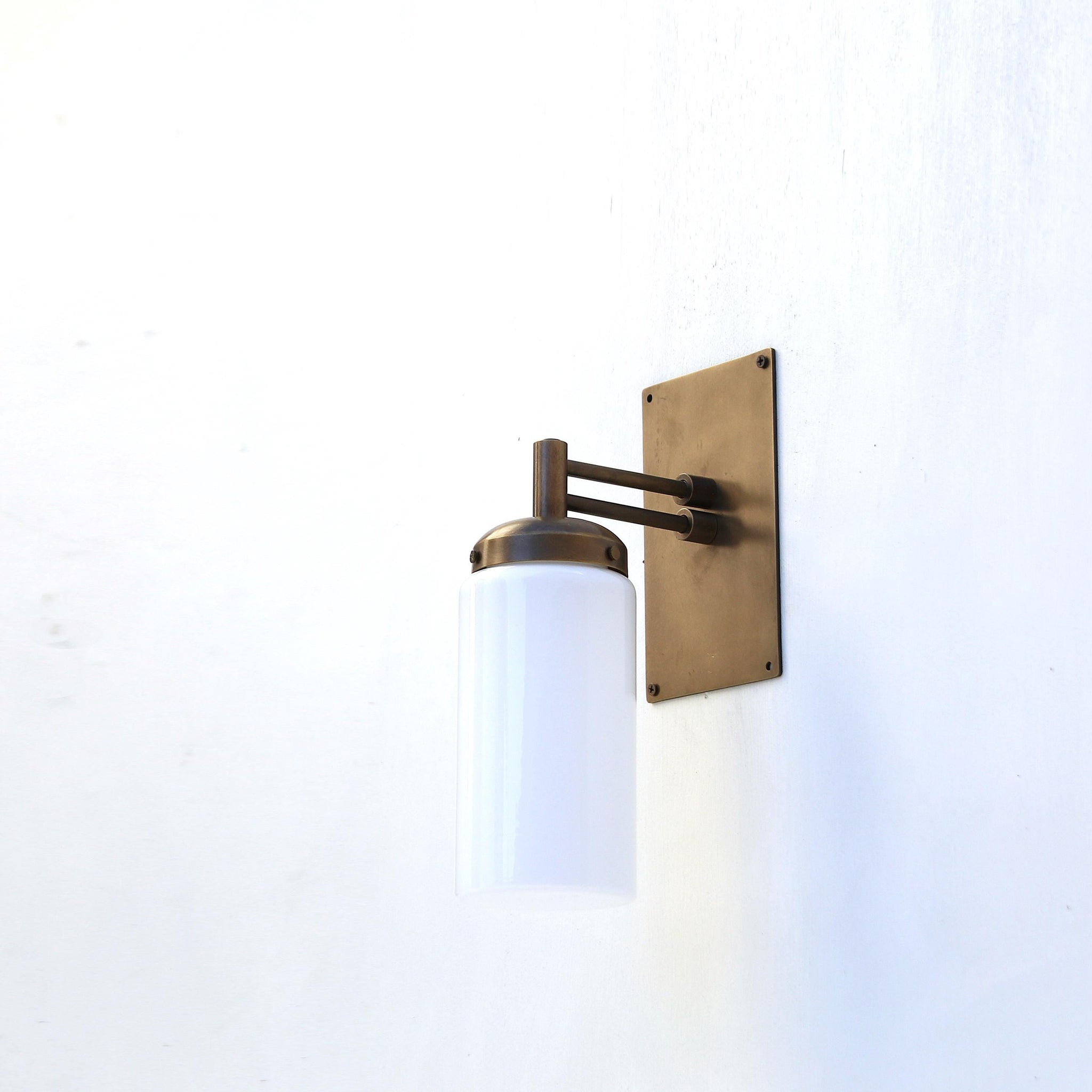 One-Light Wall Sconce with Opal Glass Cylinder and Rectangular Backplate