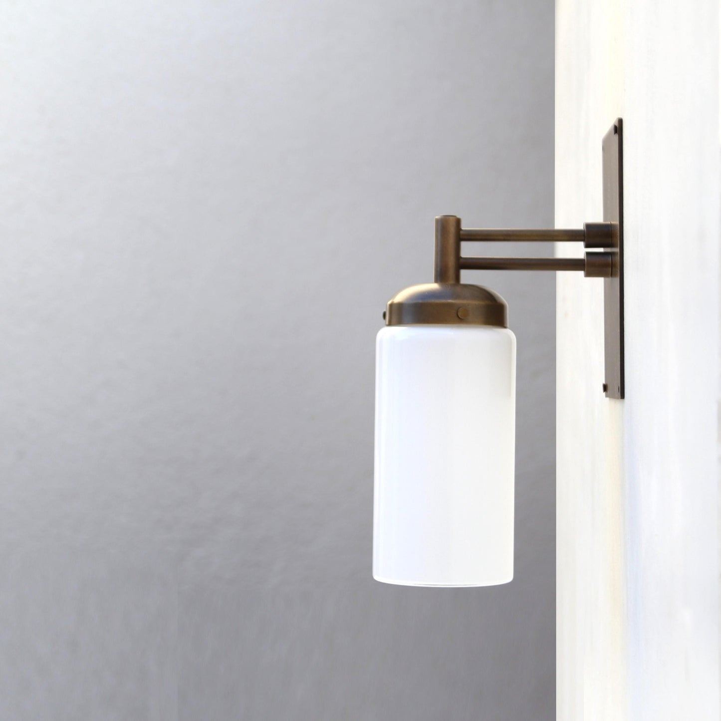 One-Light Wall Sconce with Opal Glass Cylinder and Rectangular Backplate