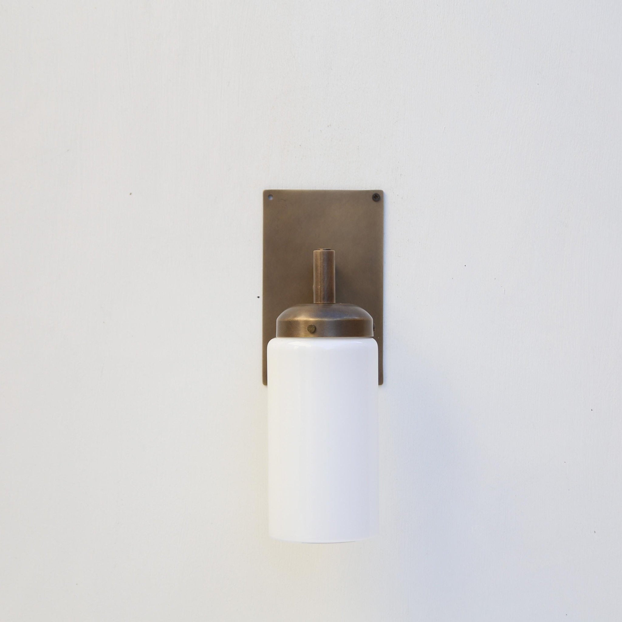One-Light Wall Sconce with Opal Glass Cylinder and Rectangular Backplate