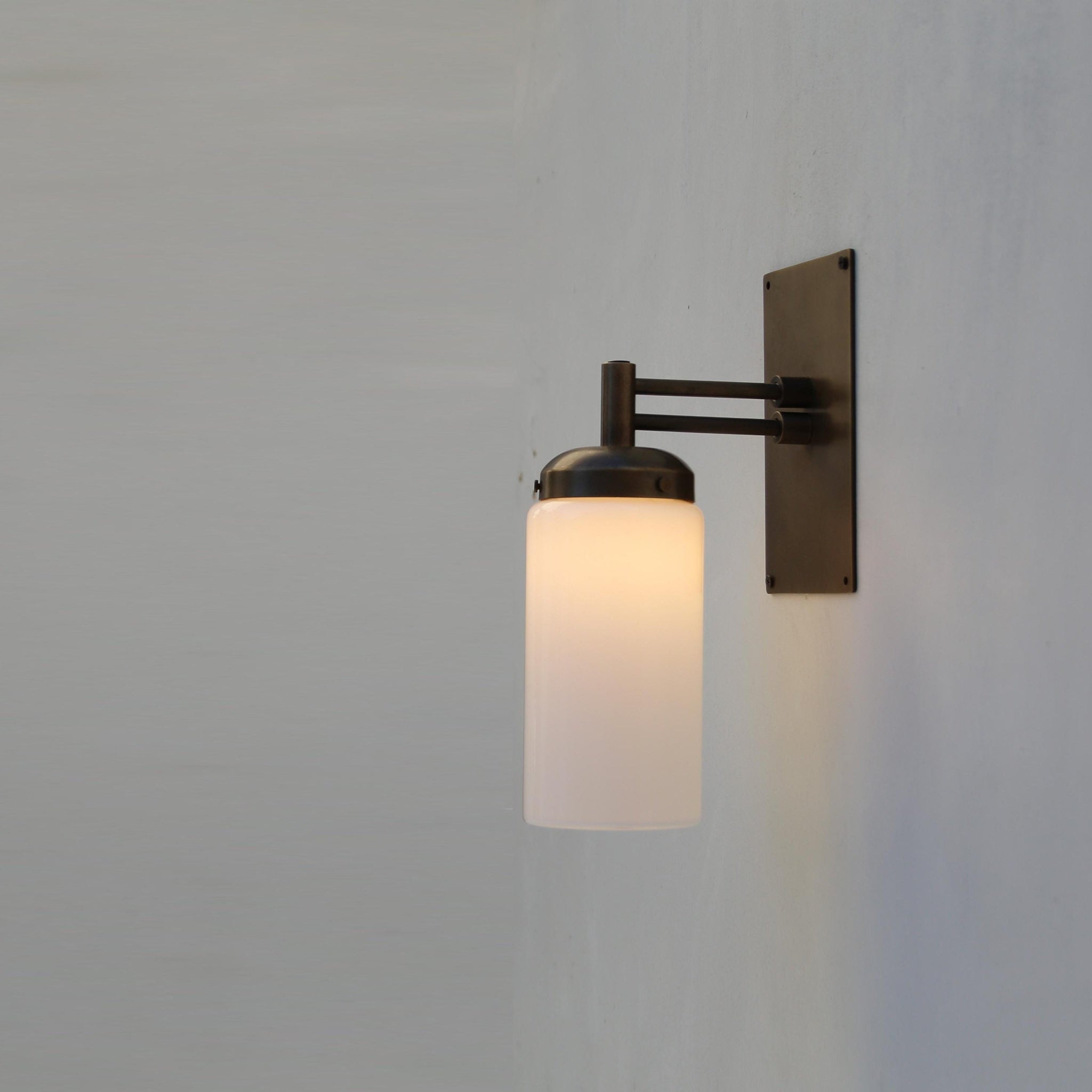 One-Light Wall Sconce with Opal Glass Cylinder and Rectangular Backplate
