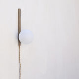 Plug-In Brass Wall Sconce with Opal Globe