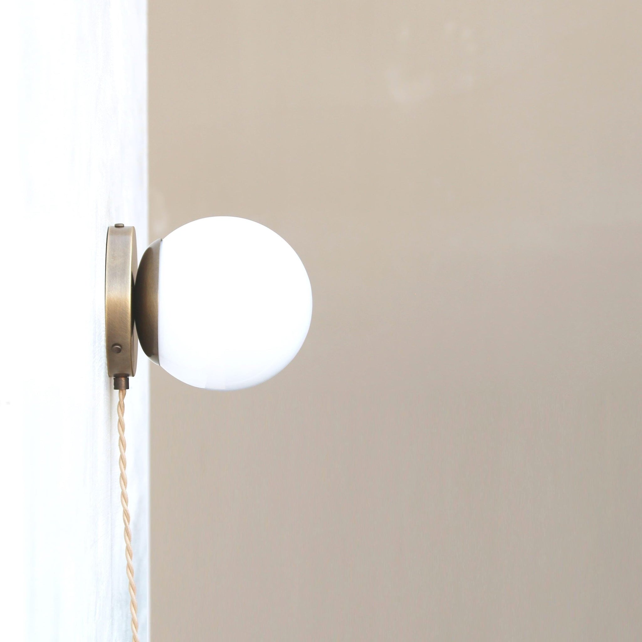 Plug-In Brass Wall Sconce with Six-Inch Opal Globe