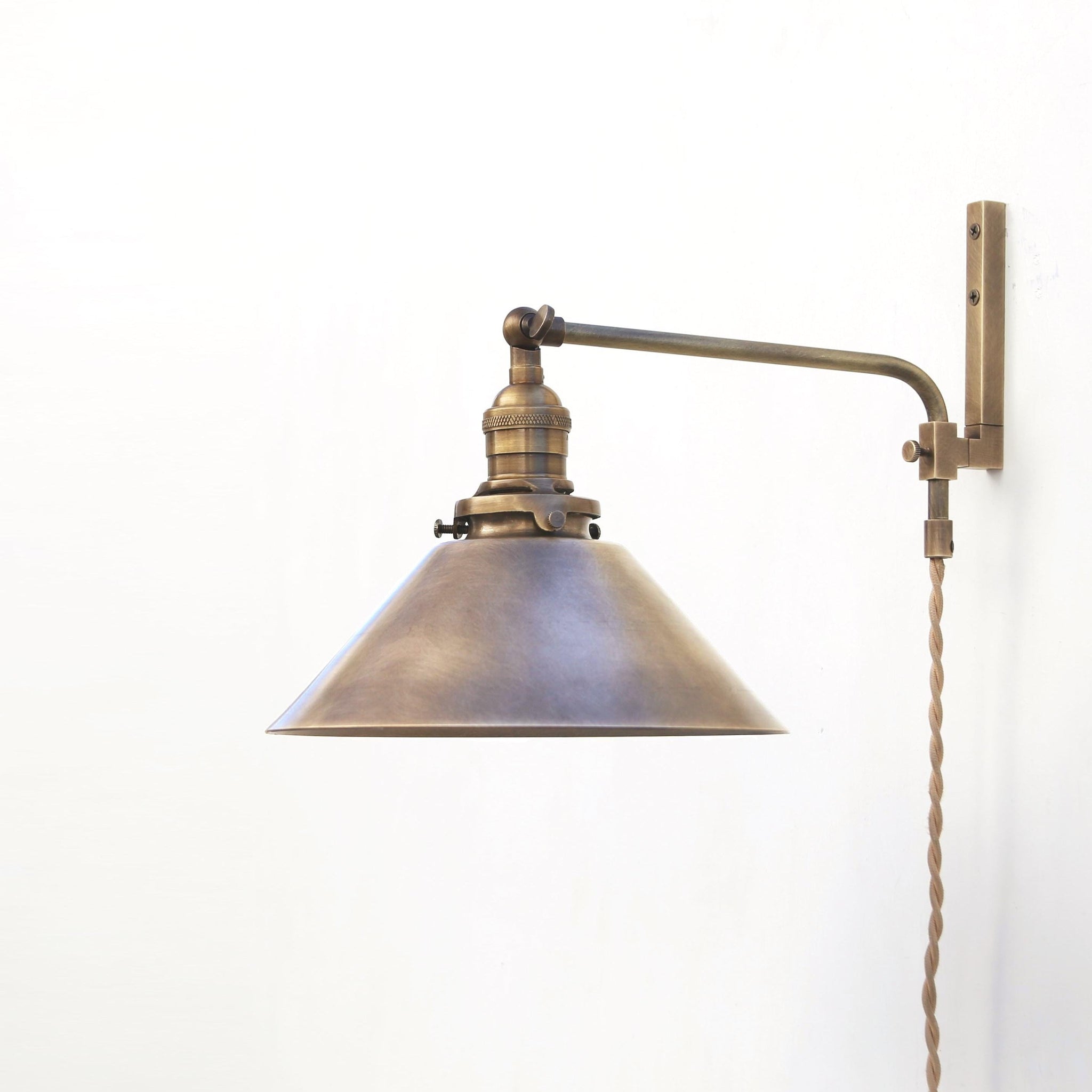 Plug-In Swing Arm Wall Sconce with Brass Cone Shade