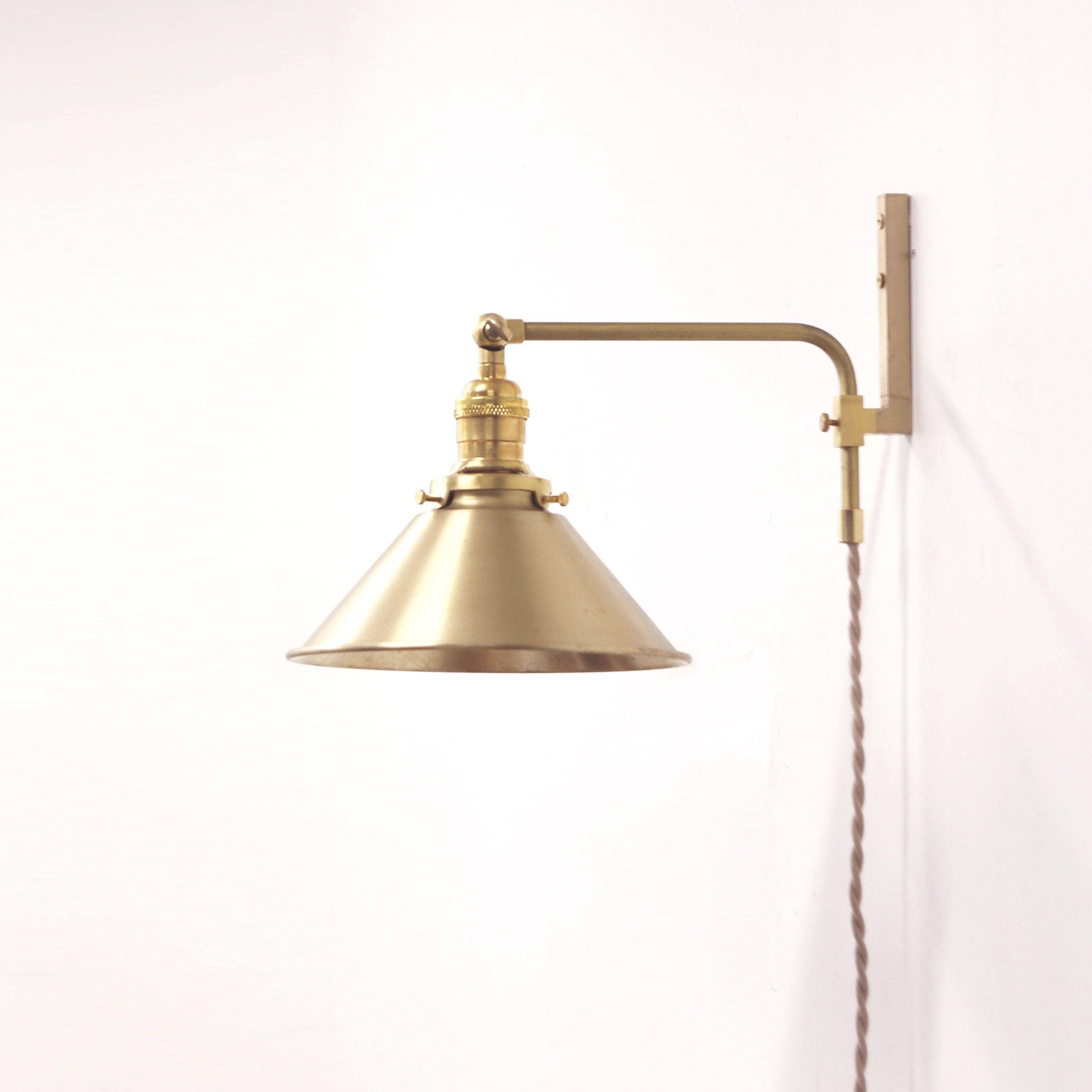 Plug-In Swing Arm Wall Sconce with Brass Cone Shade