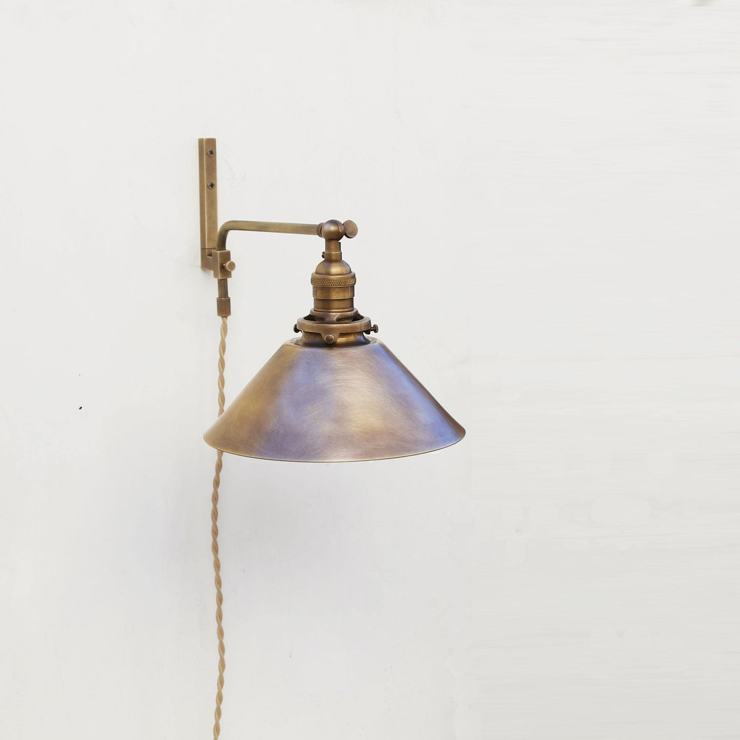 Plug-In Swing Arm Wall Sconce with Brass Cone Shade