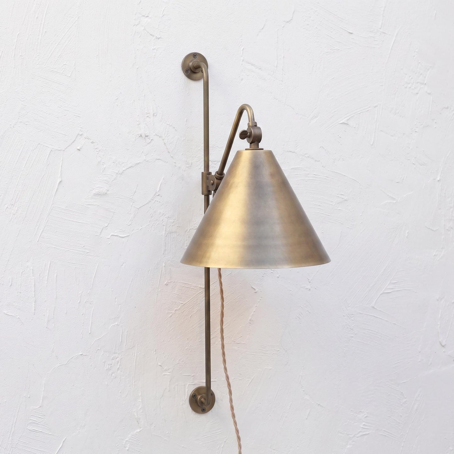 Plug-In Swing Arm Wall Sconce with Brass Cone Shade