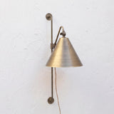 Plug-In Swing Arm Wall Sconce with Brass Cone Shade