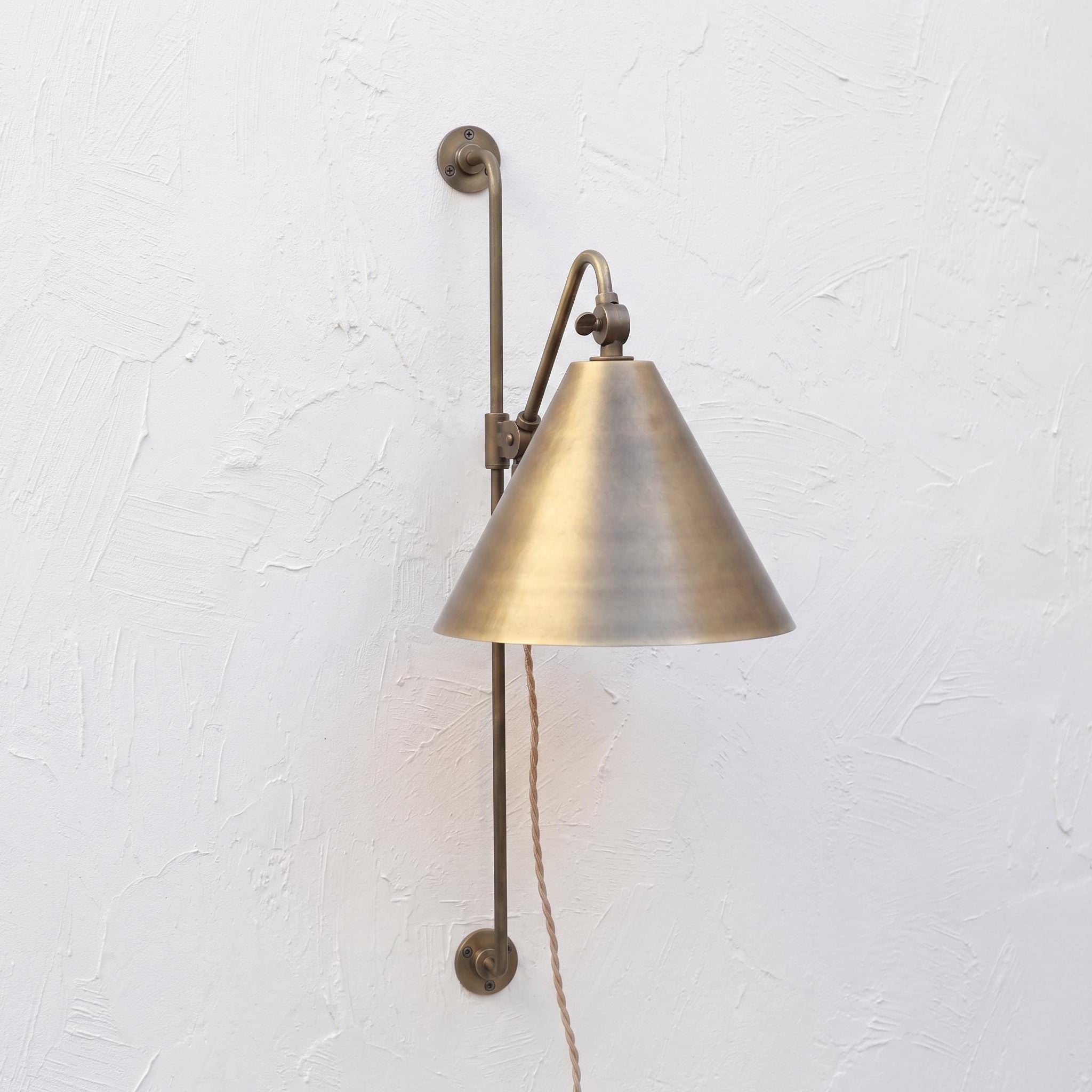 Plug-In Swing Arm Wall Sconce with Brass Cone Shade