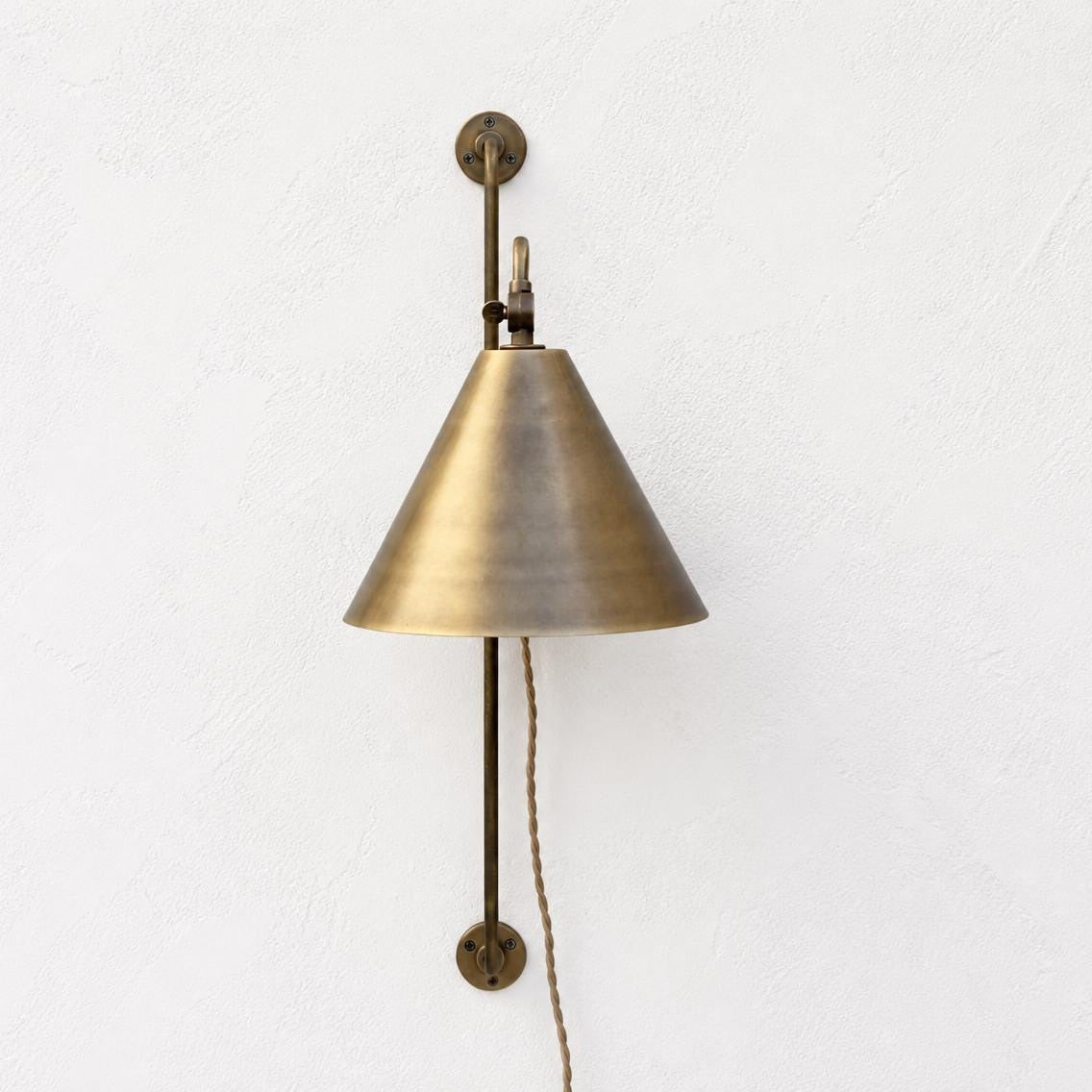 Plug-In Swing Arm Wall Sconce with Brass Cone Shade