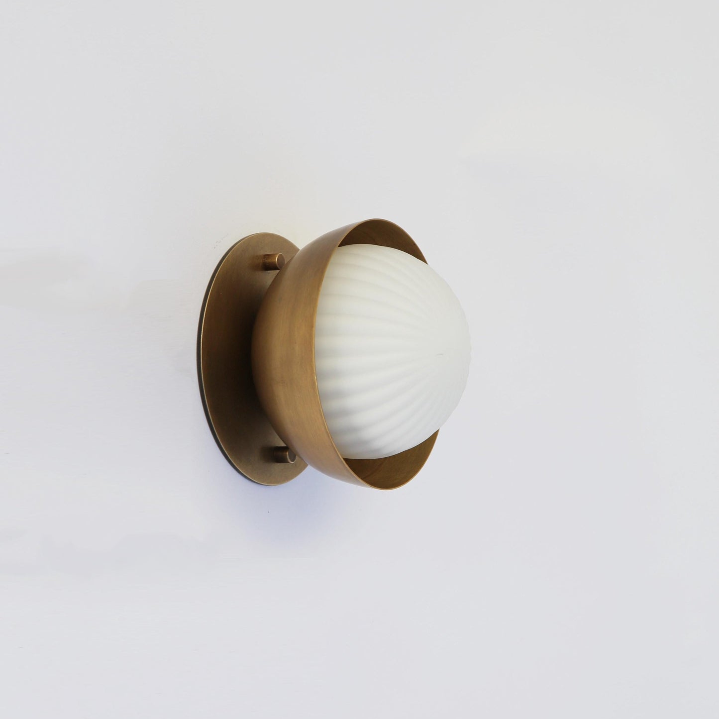 Ribbed Opal Globe Wall Sconce with Brass Half Shade