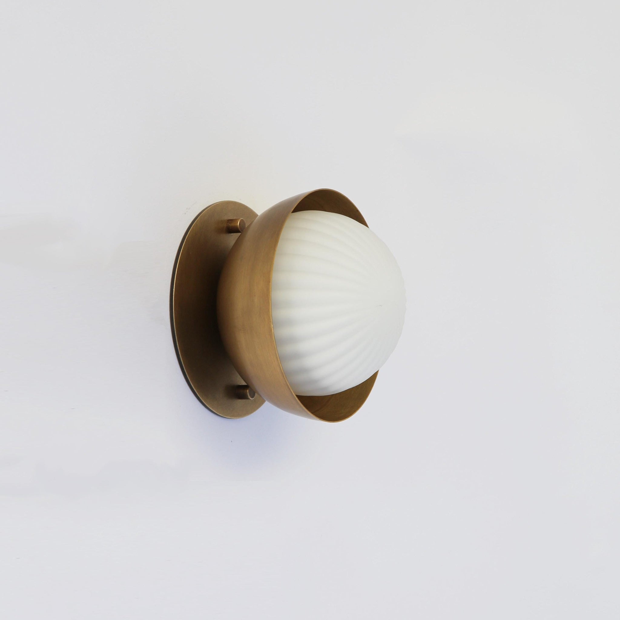 Ribbed Opal Globe Wall Sconce with Brass Half Shade