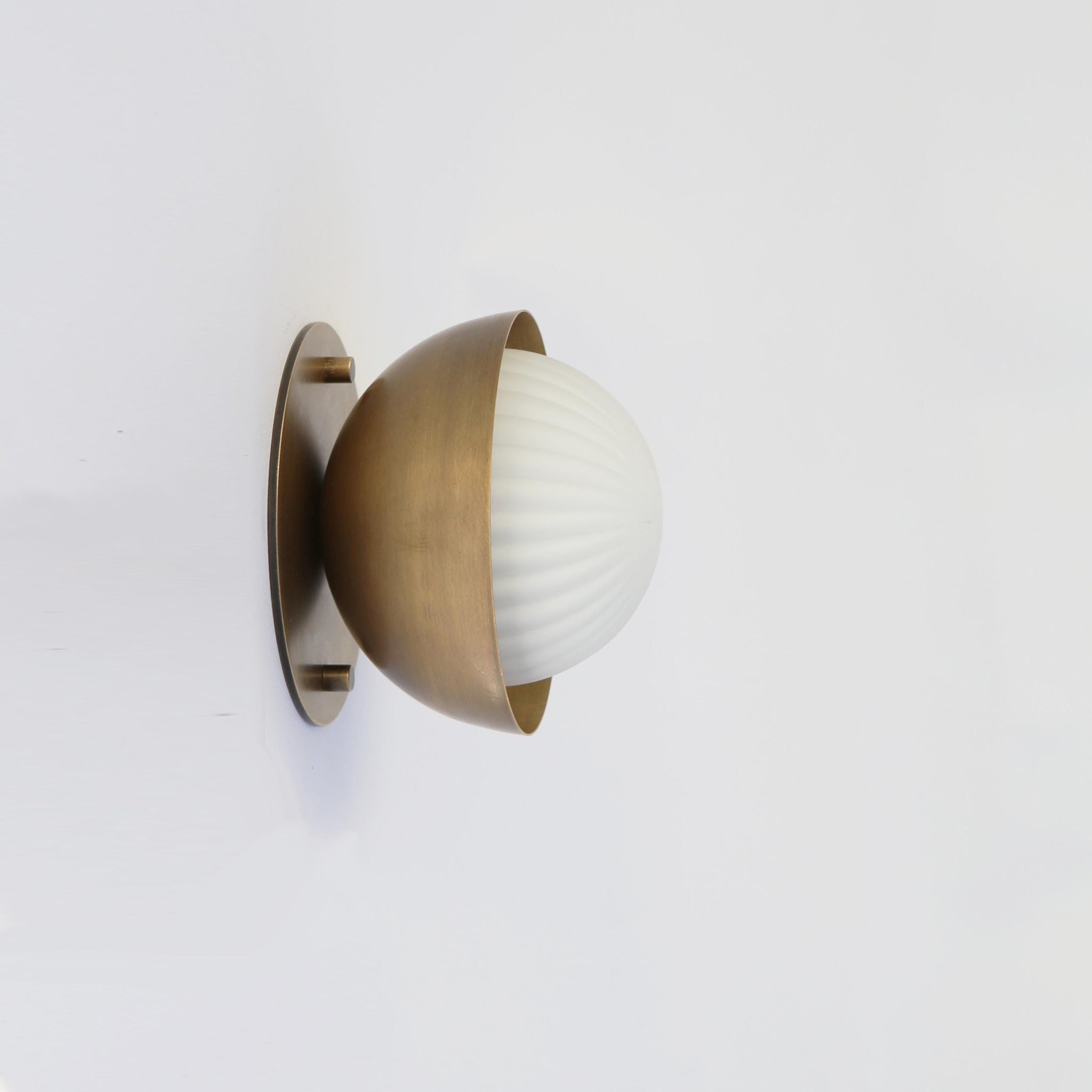 Ribbed Opal Globe Wall Sconce with Brass Half Shade