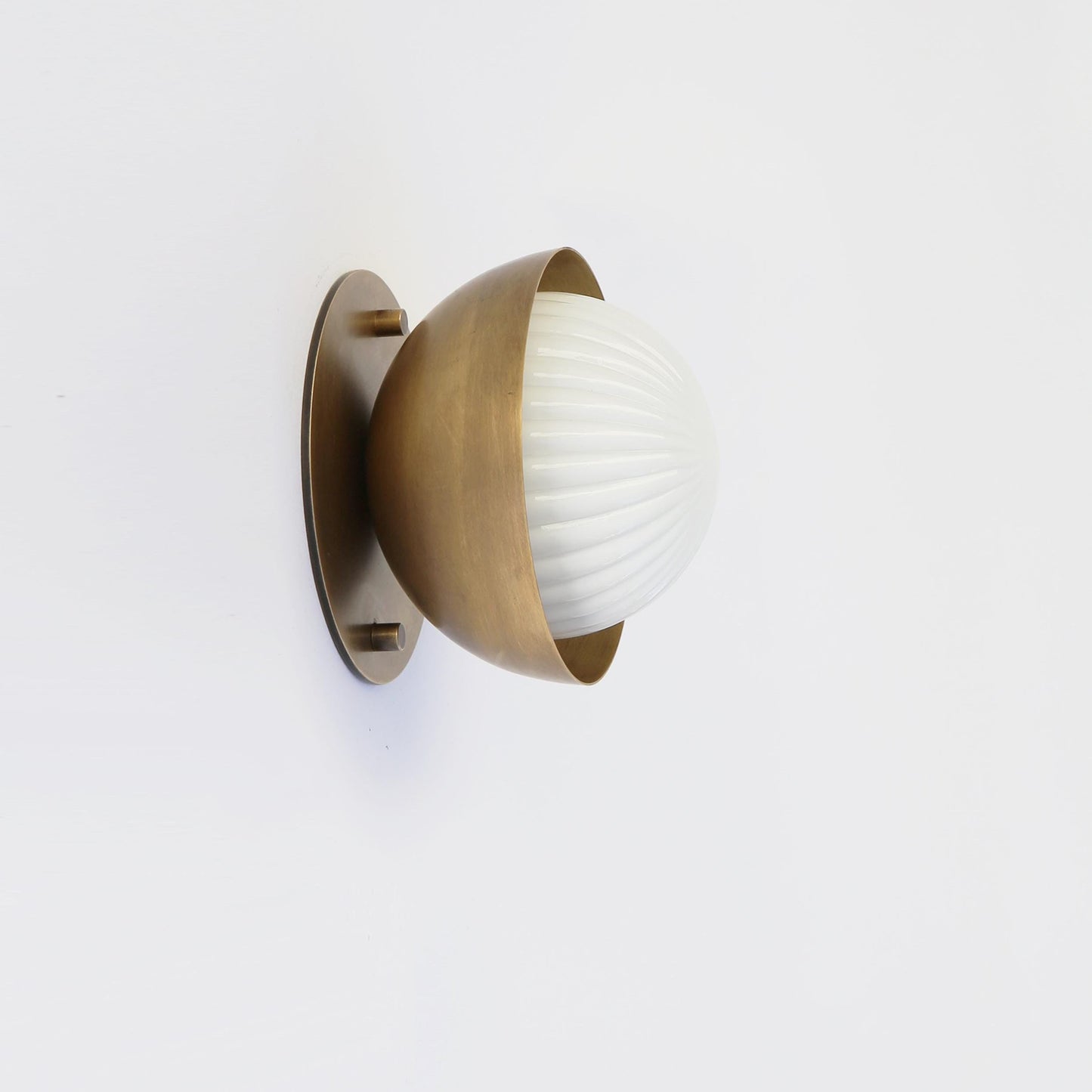 Ribbed Opal Globe Wall Sconce with Brass Half Shade