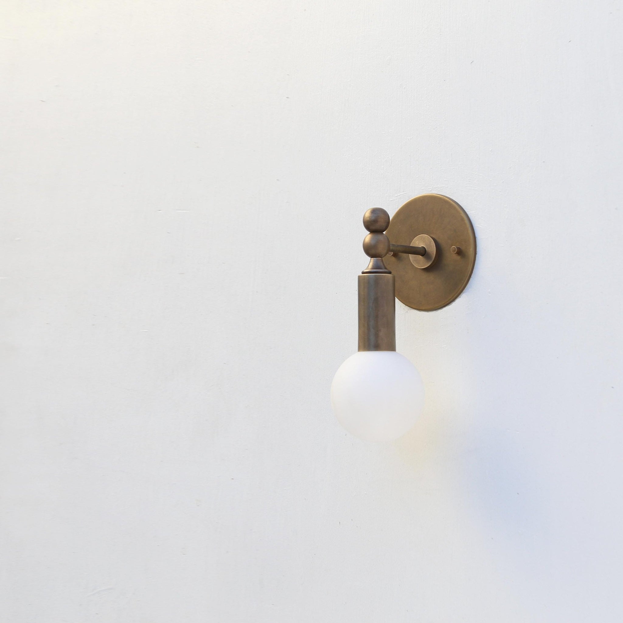 Single-Light Opal Globe Wall Sconce with Ball Joint
