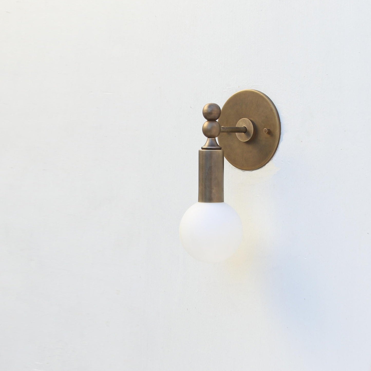 Single-Light Opal Globe Wall Sconce with Ball Joint