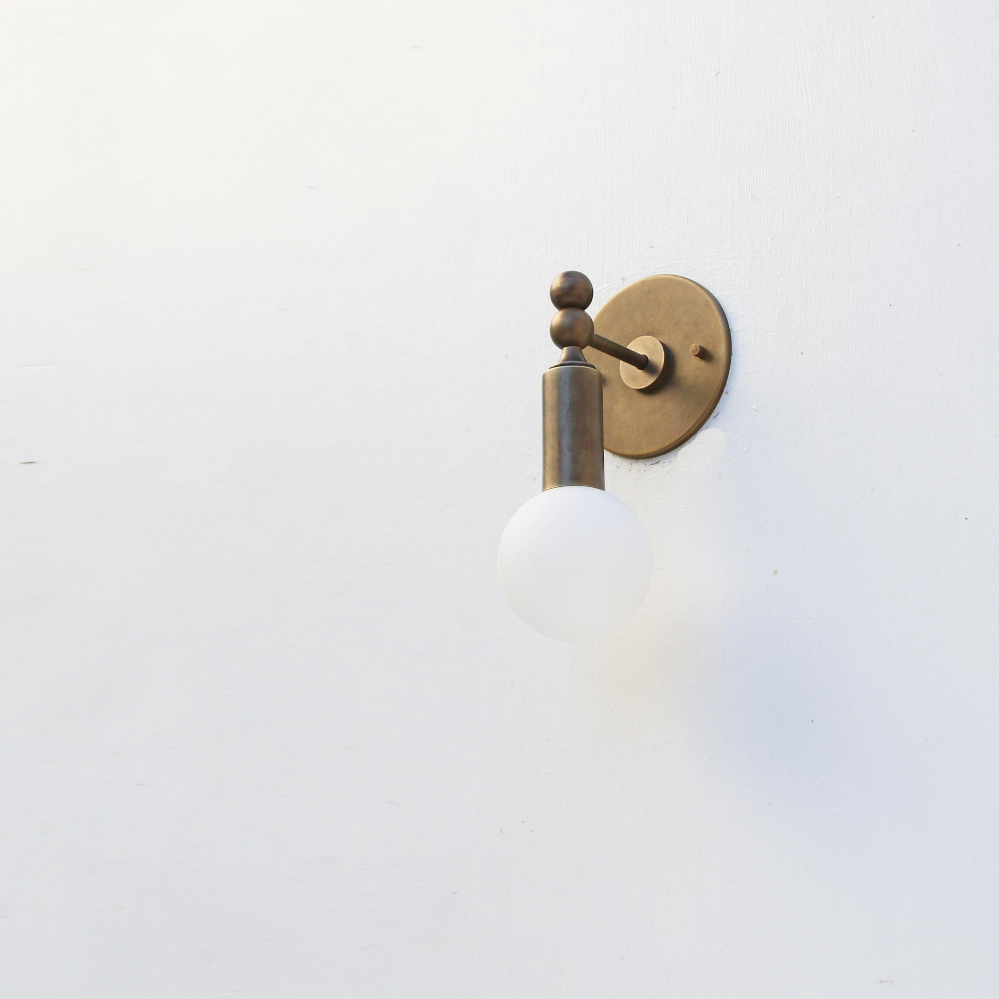 Single-Light Opal Globe Wall Sconce with Ball Joint