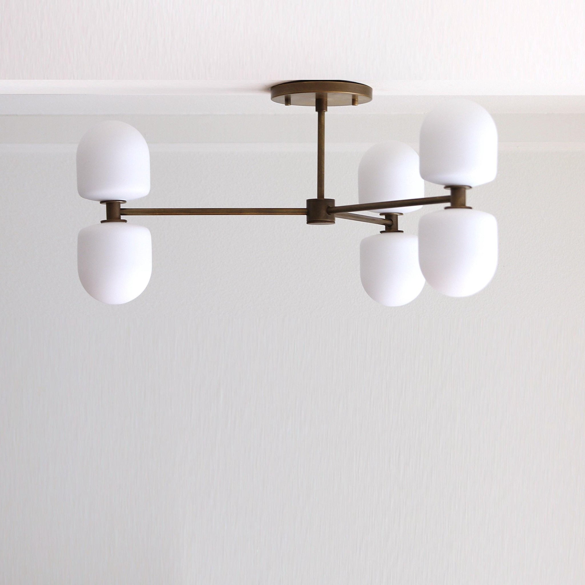 Six-Light Brass Chandelier with Opal Capsule Shades