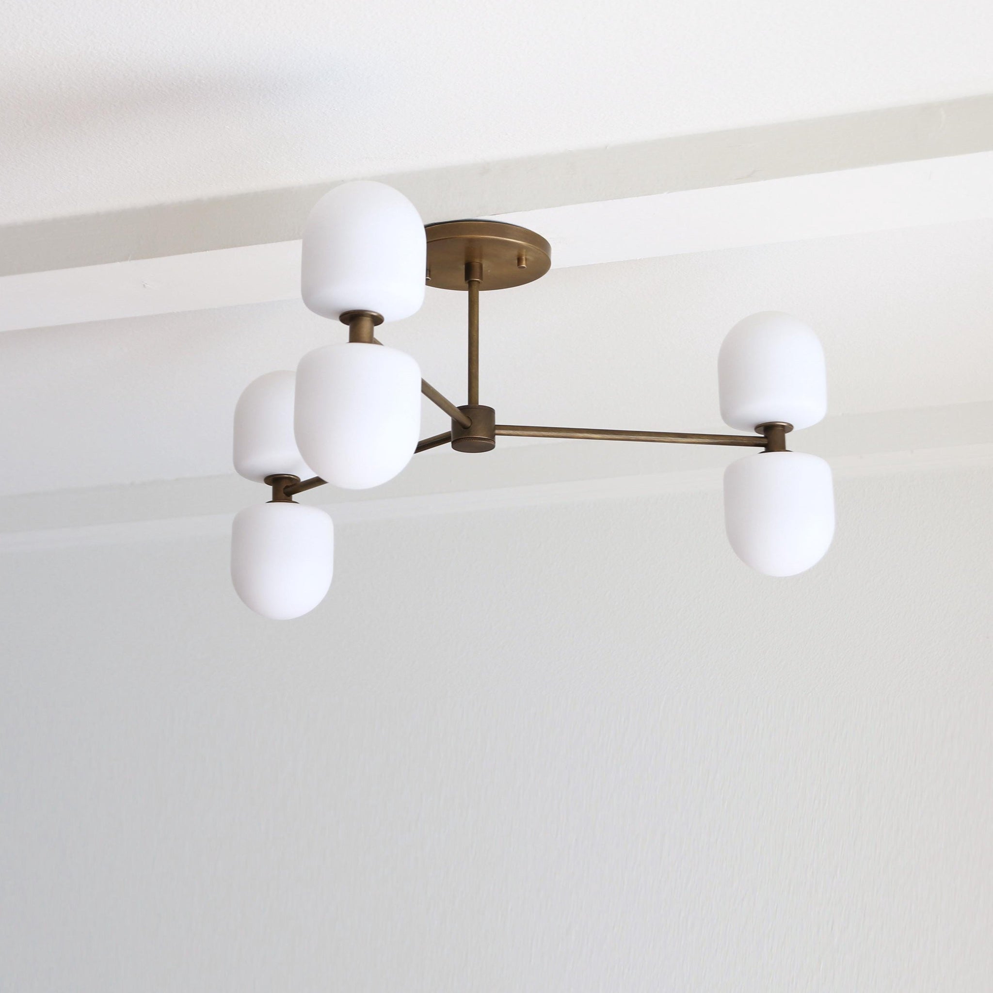 Six-Light Brass Chandelier with Opal Capsule Shades