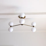 Six-Light Brass Chandelier with Opal Glass Globes