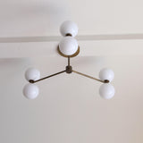 Six-Light Brass Chandelier with Opal Glass Globes