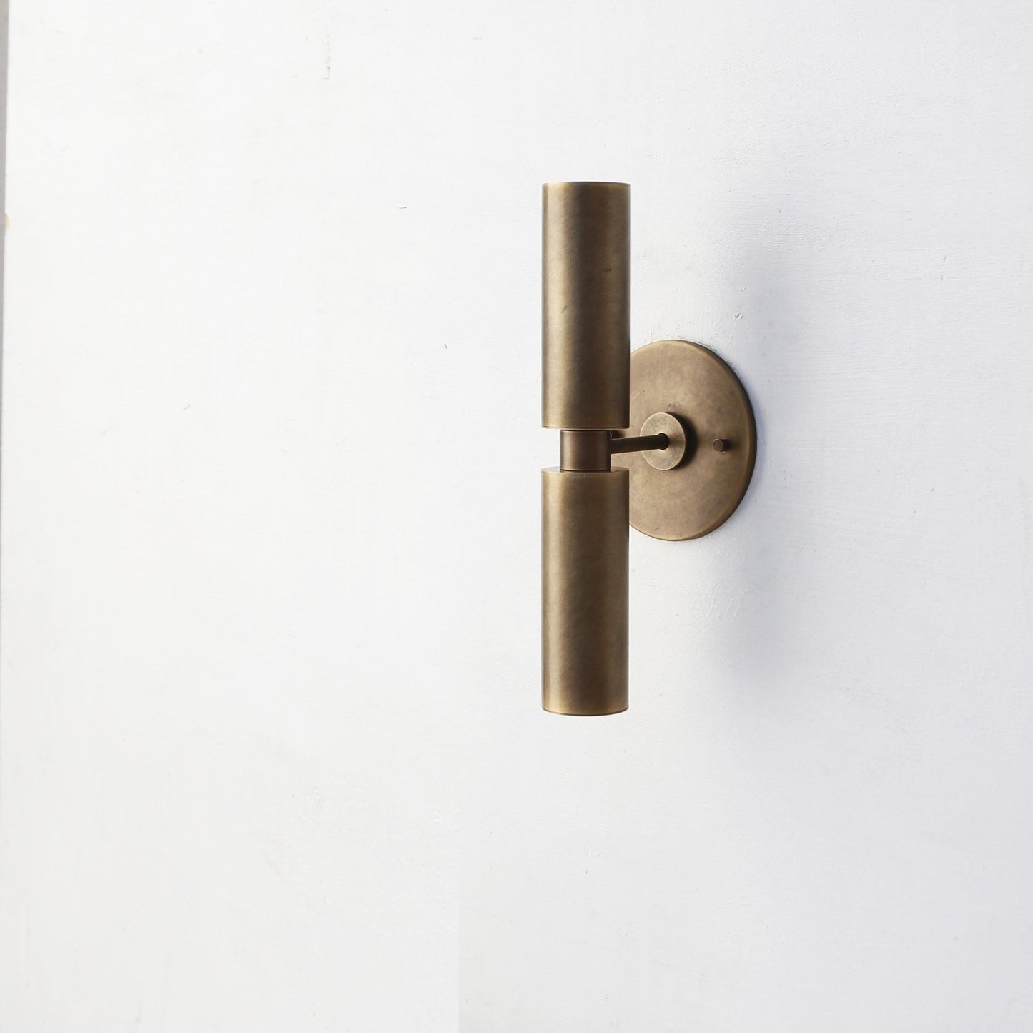 Slim Brass Cylinder Up and Down Wall Sconce