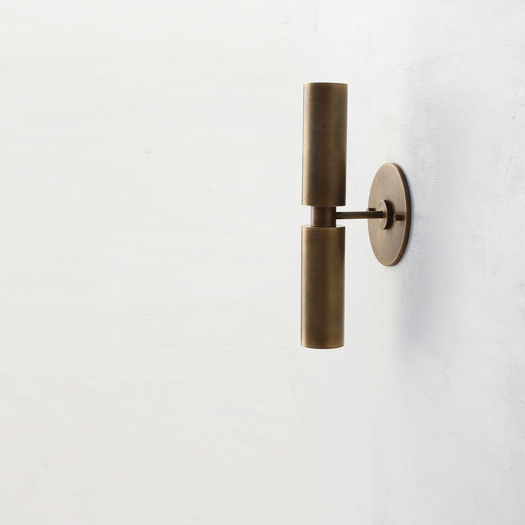 Slim Brass Cylinder Up and Down Wall Sconce