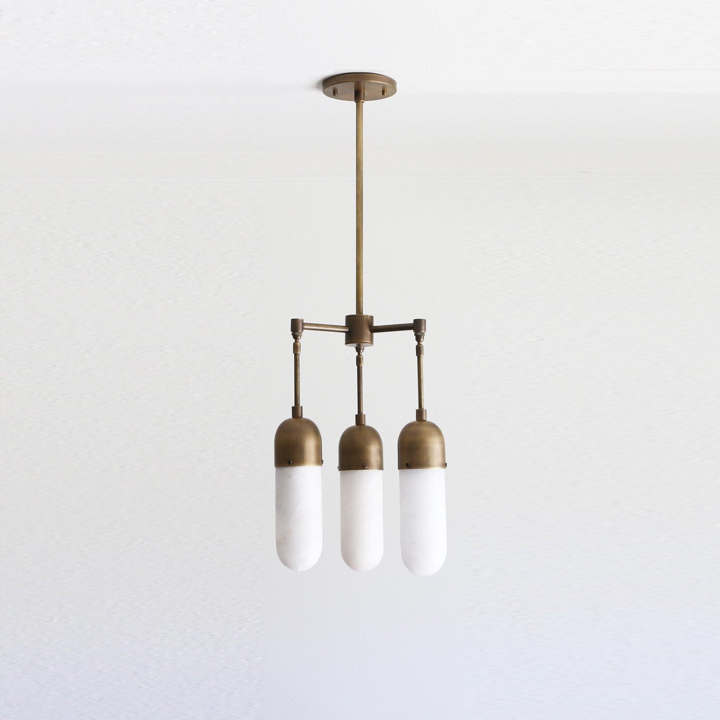 Three-Light Brass Chandelier with Alabaster Capsule Shades