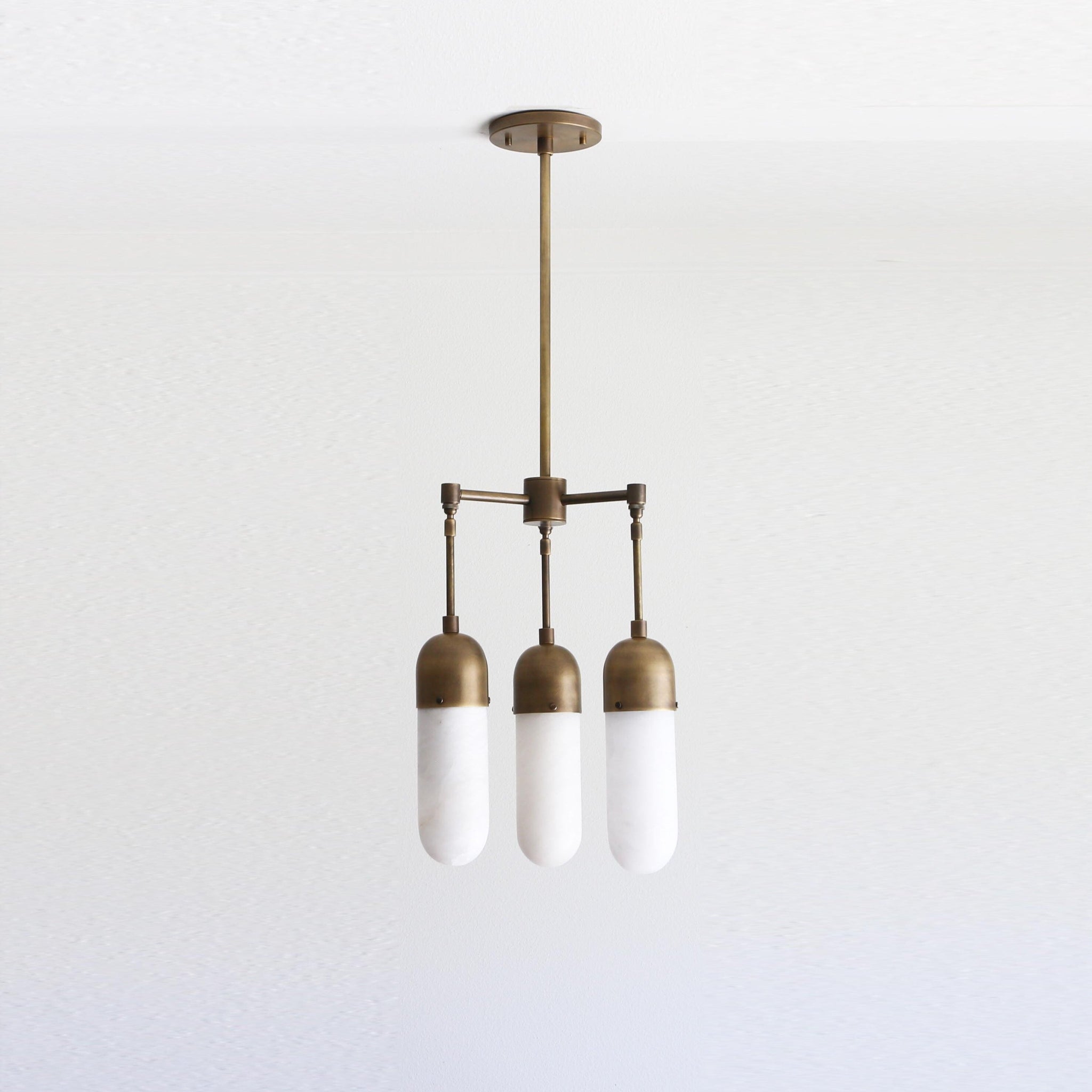 Three-Light Brass Chandelier with Alabaster Capsule Shades