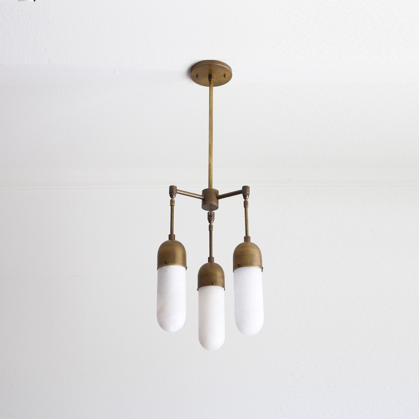 Three-Light Brass Chandelier with Alabaster Capsule Shades