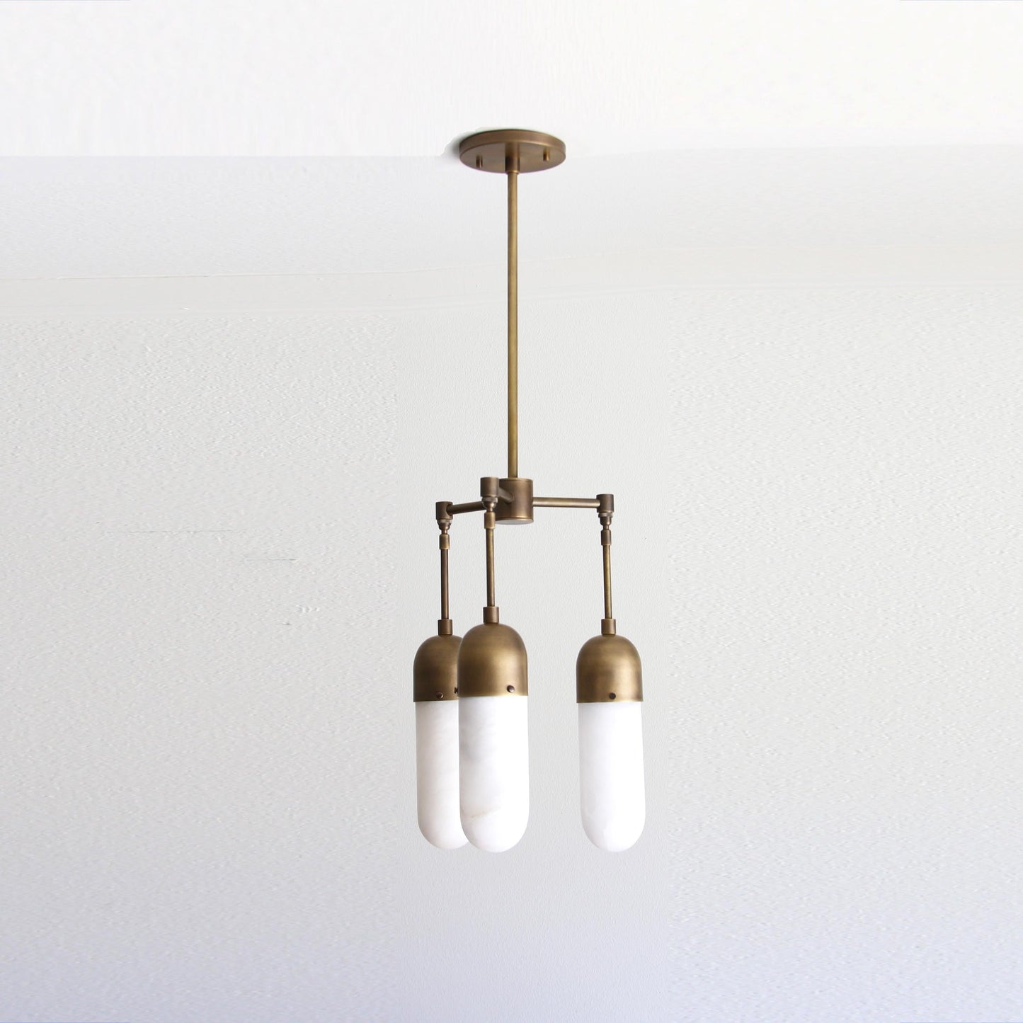 Three-Light Brass Chandelier with Alabaster Capsule Shades