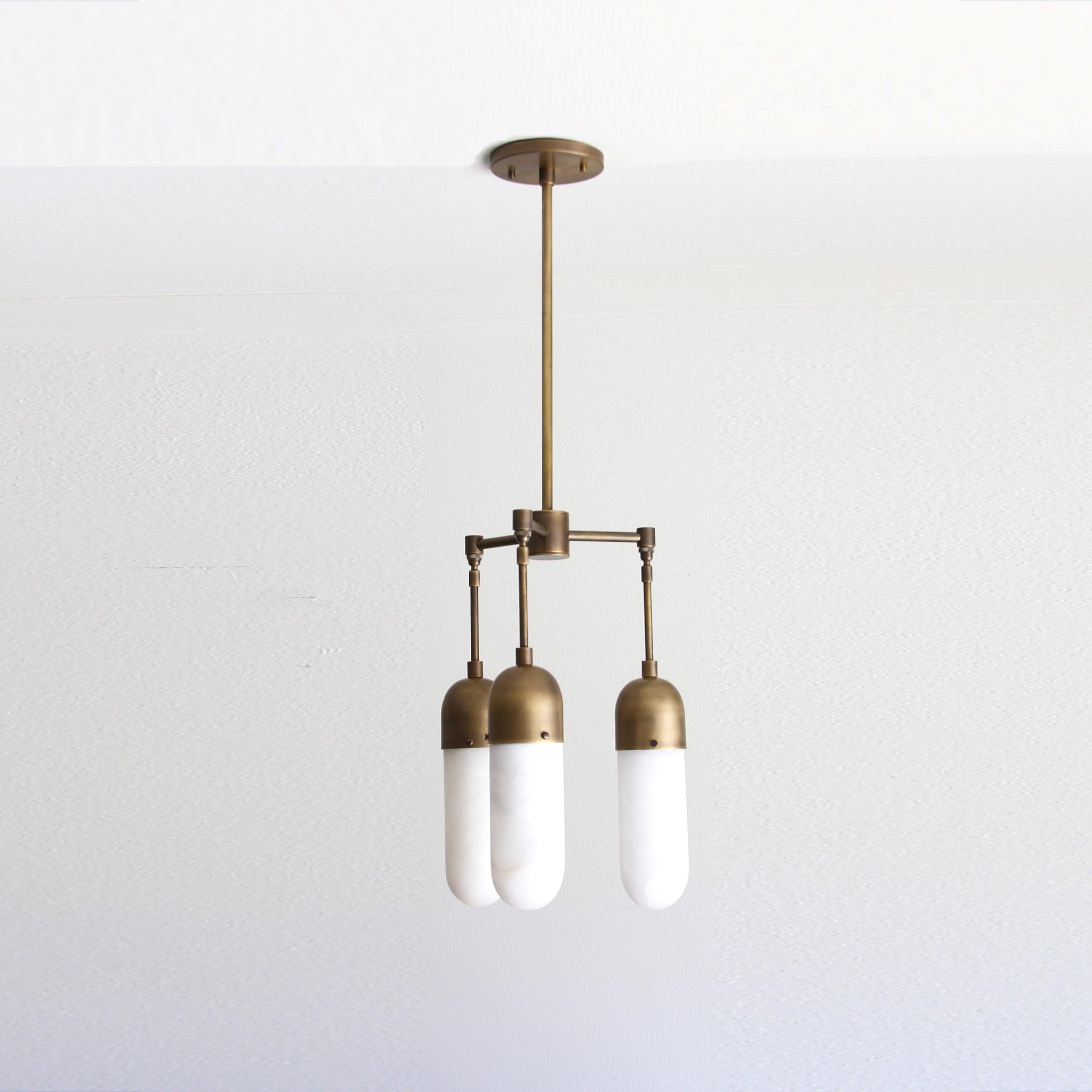 Three-Light Brass Chandelier with Alabaster Capsule Shades