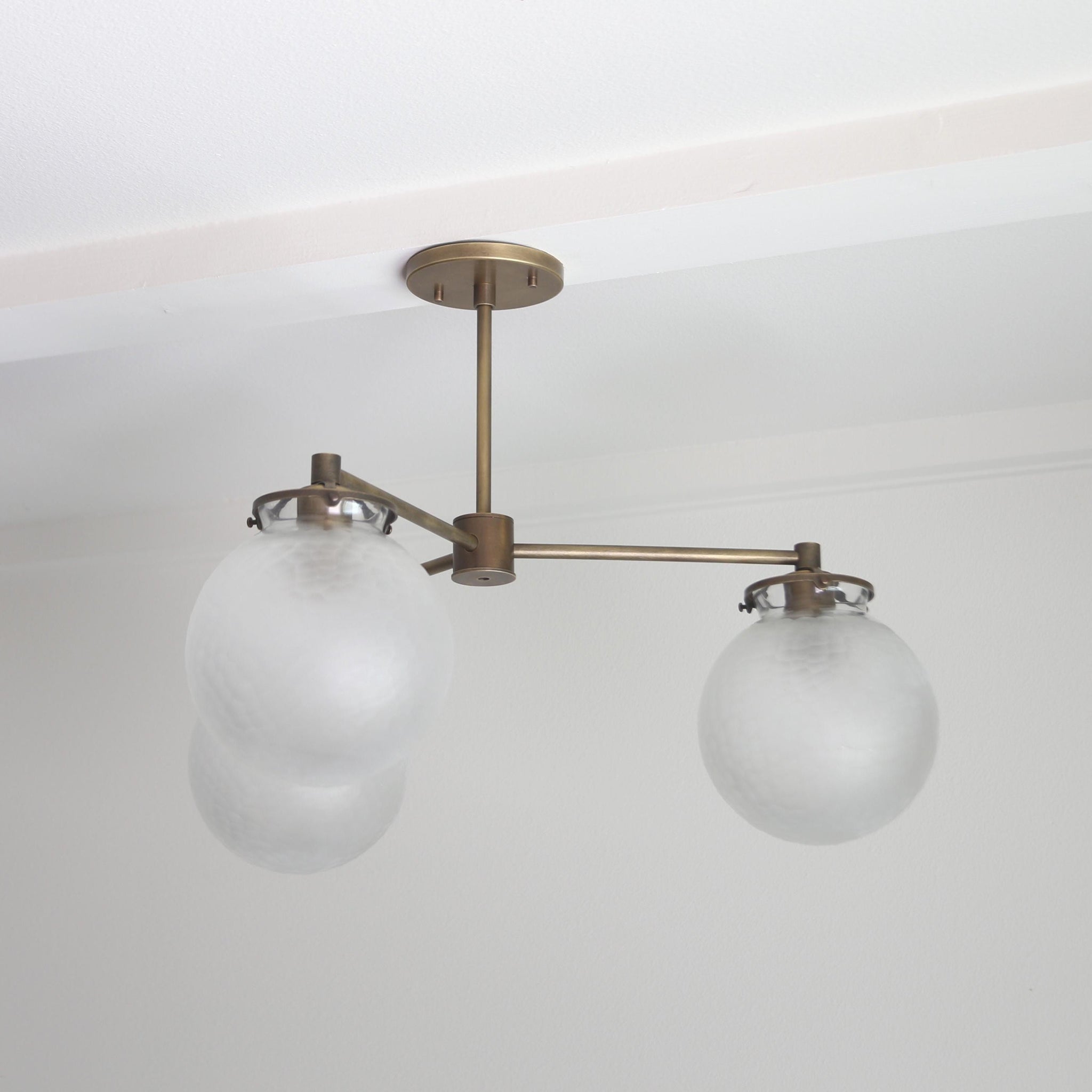 Three-Light Brass Chandelier with Frosted Globes