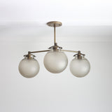 Three-Light Brass Chandelier with Frosted Globes