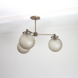 Three-Light Brass Chandelier with Frosted Globes