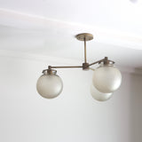 Three-Light Brass Chandelier with Frosted Globes