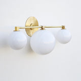 Three-Light Brass Vanity Sconce with Opal Globes