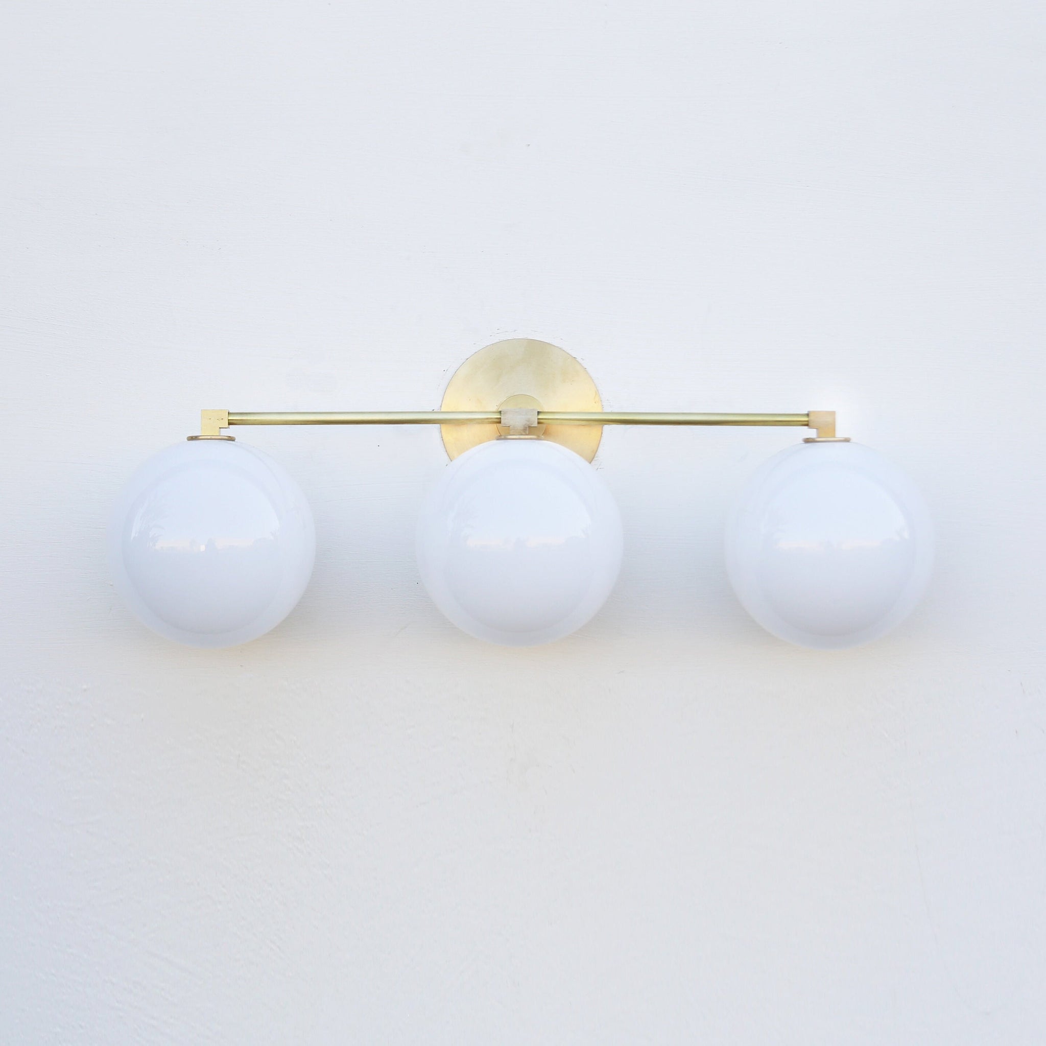 Three-Light Brass Vanity Sconce with Six-Inch Opal Globes