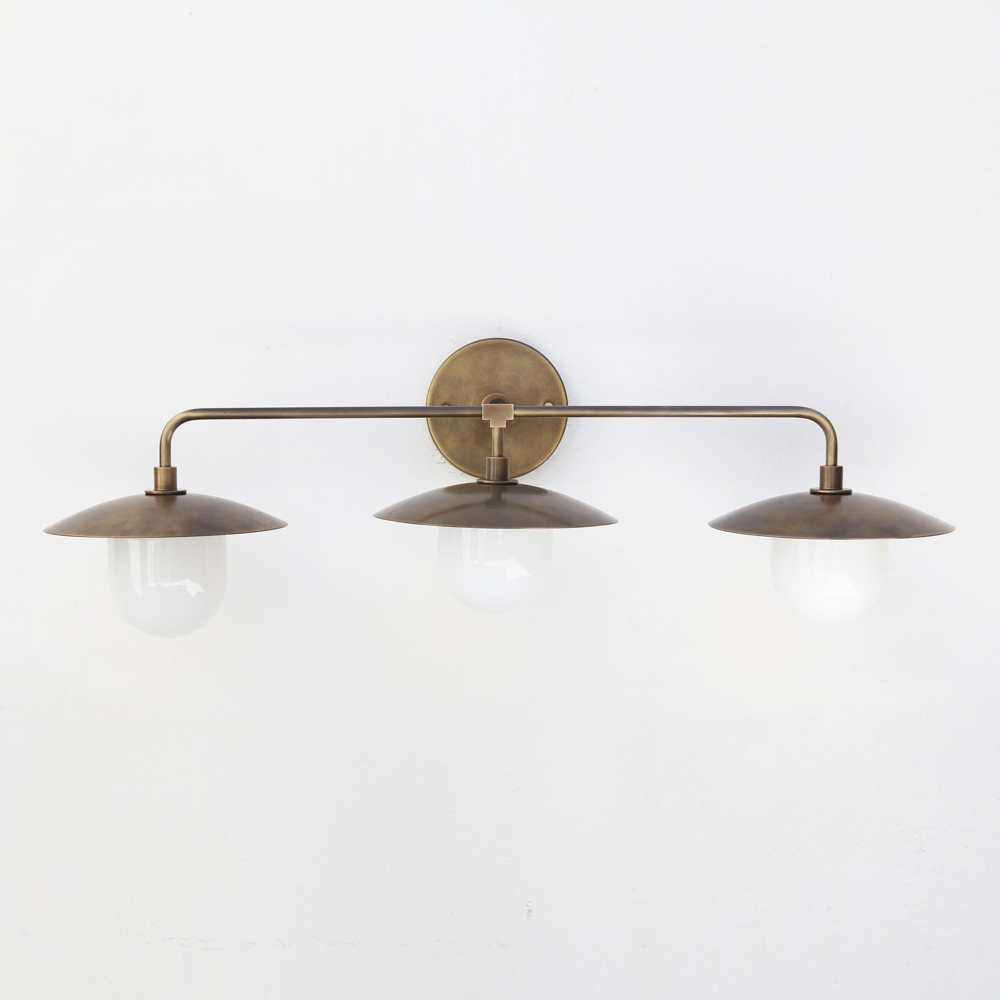 Three-Light Brass Wall Sconce with Disc Shades