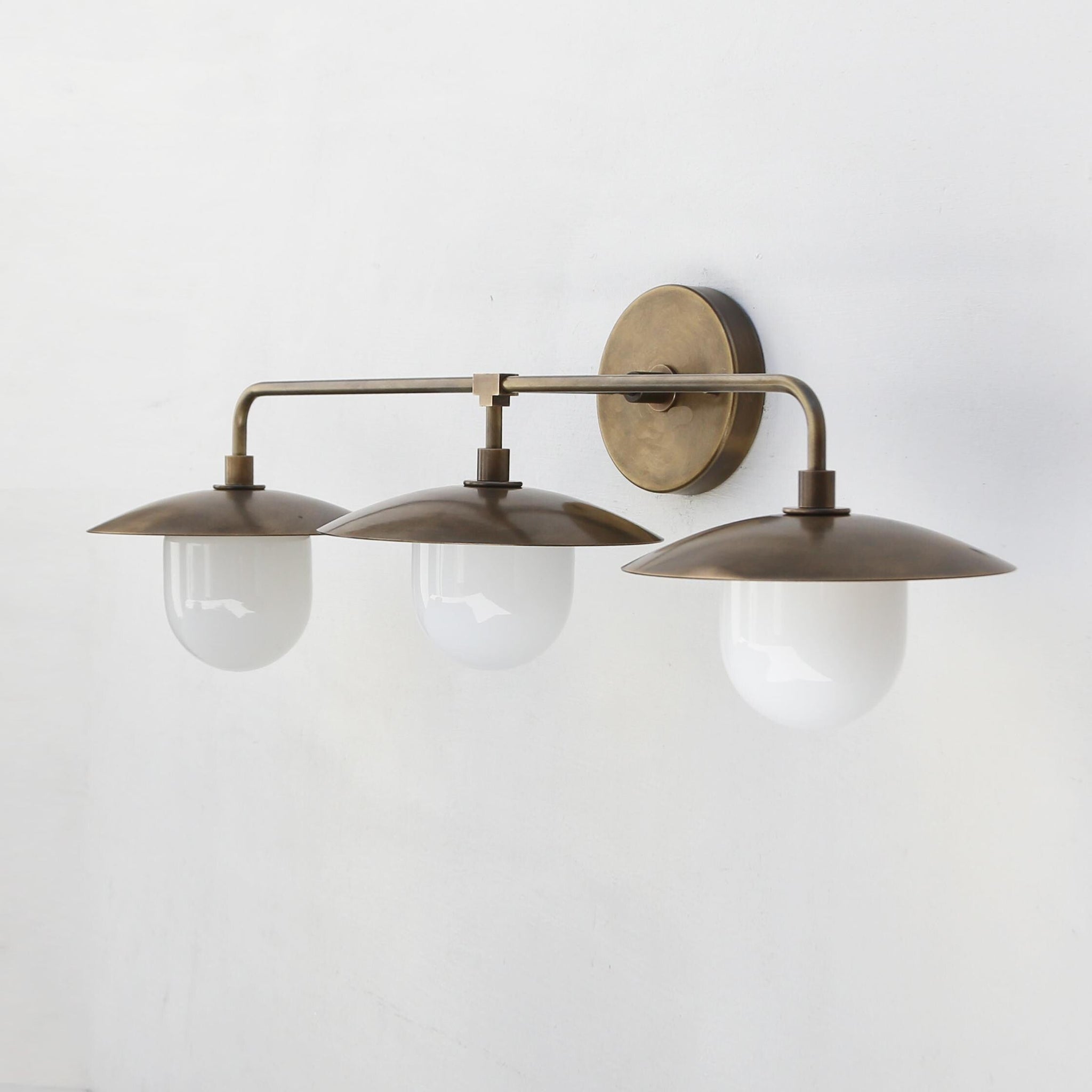 Three-Light Brass Wall Sconce with Disc Shades