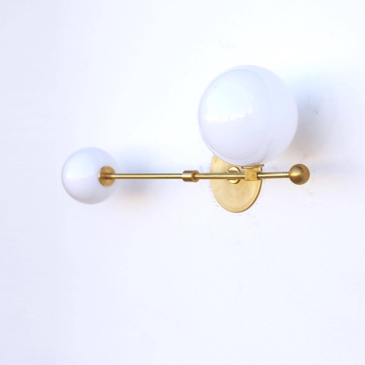 Two-Light Asymmetric Globe Vanity Sconce