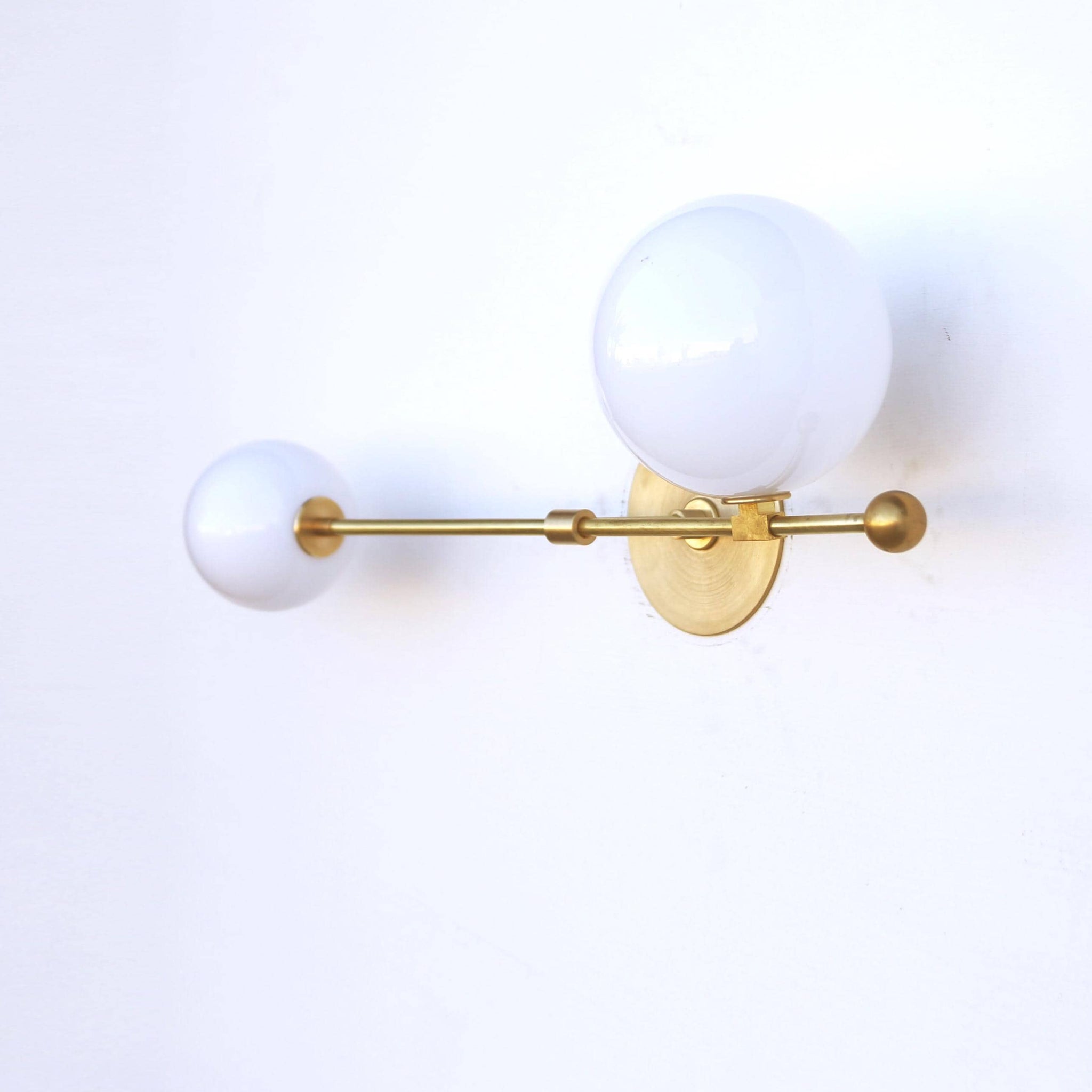 Two-Light Asymmetric Globe Vanity Sconce