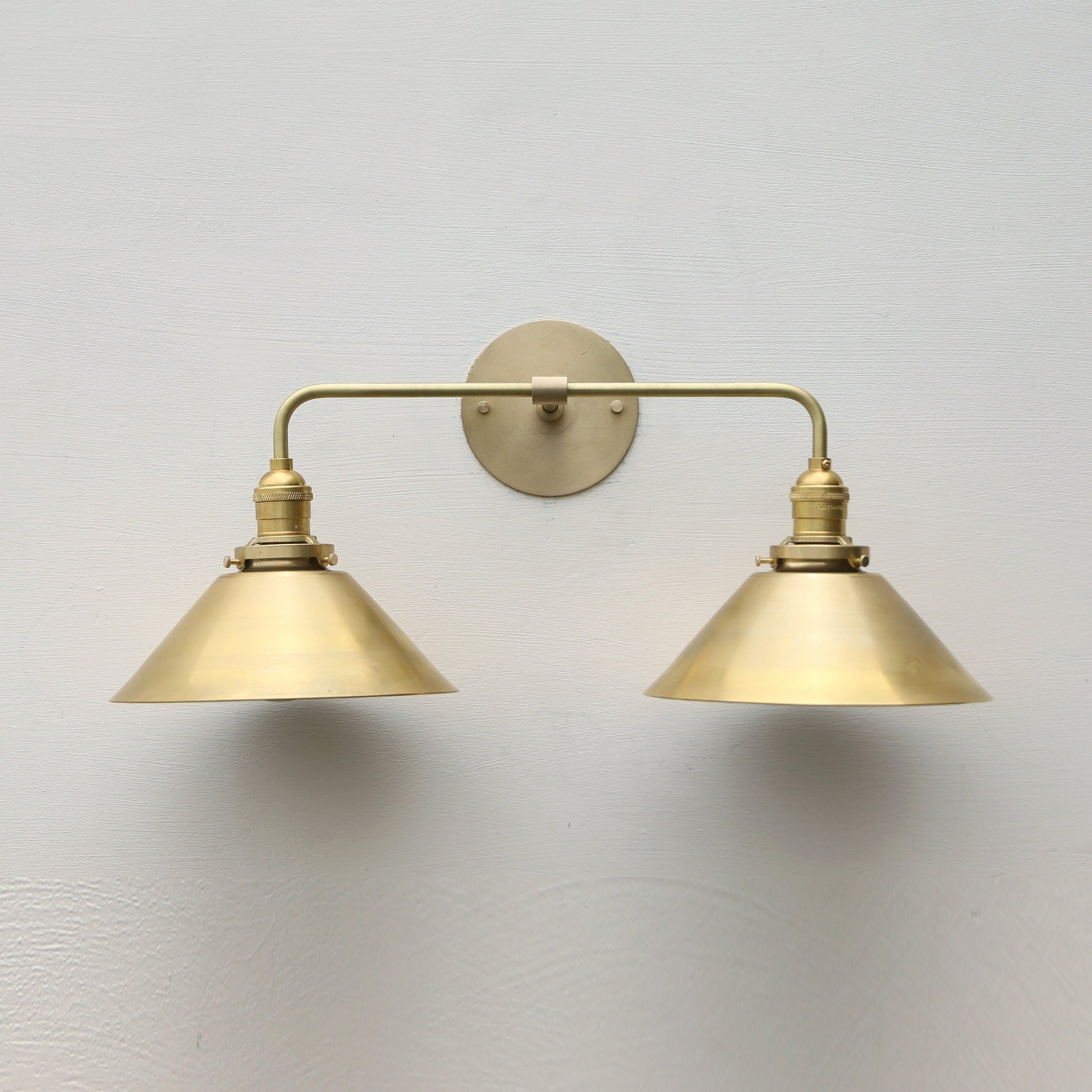 Two-Light Brass Cone Shade Vanity Sconce