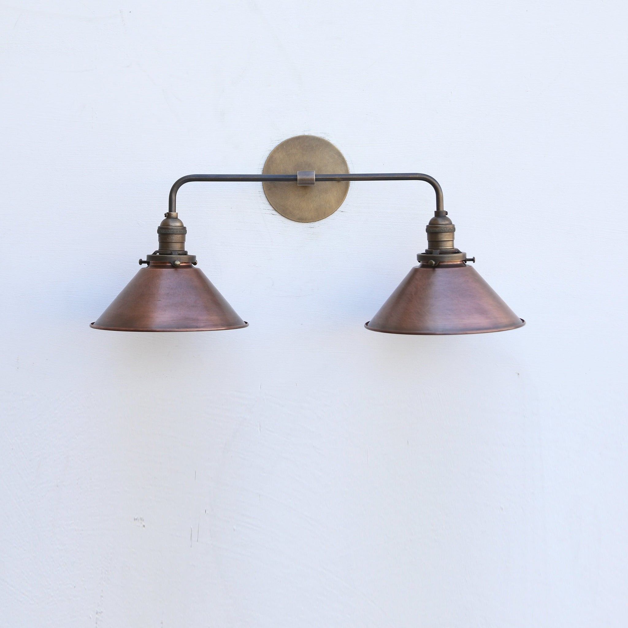 Two-Light Brass Cone Shade Vanity Sconce