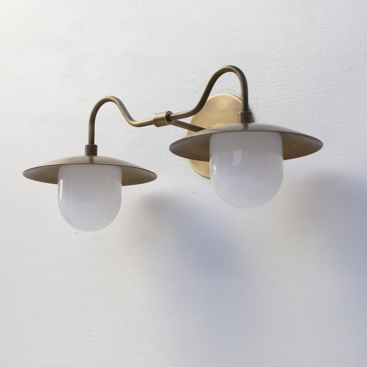 Two-Light Brass Gooseneck Wall Sconce with Glass Shades