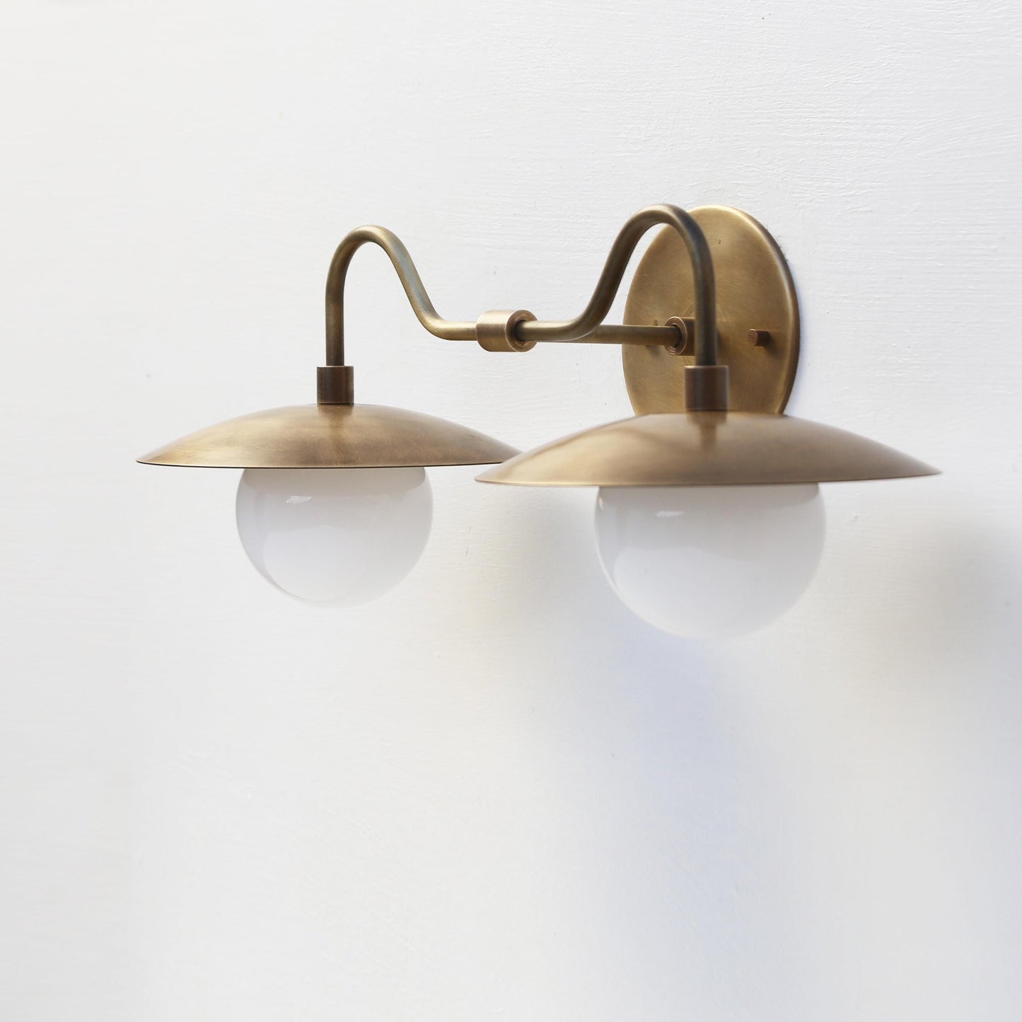 Two-Light Brass Gooseneck Wall Sconce with Opal Globes
