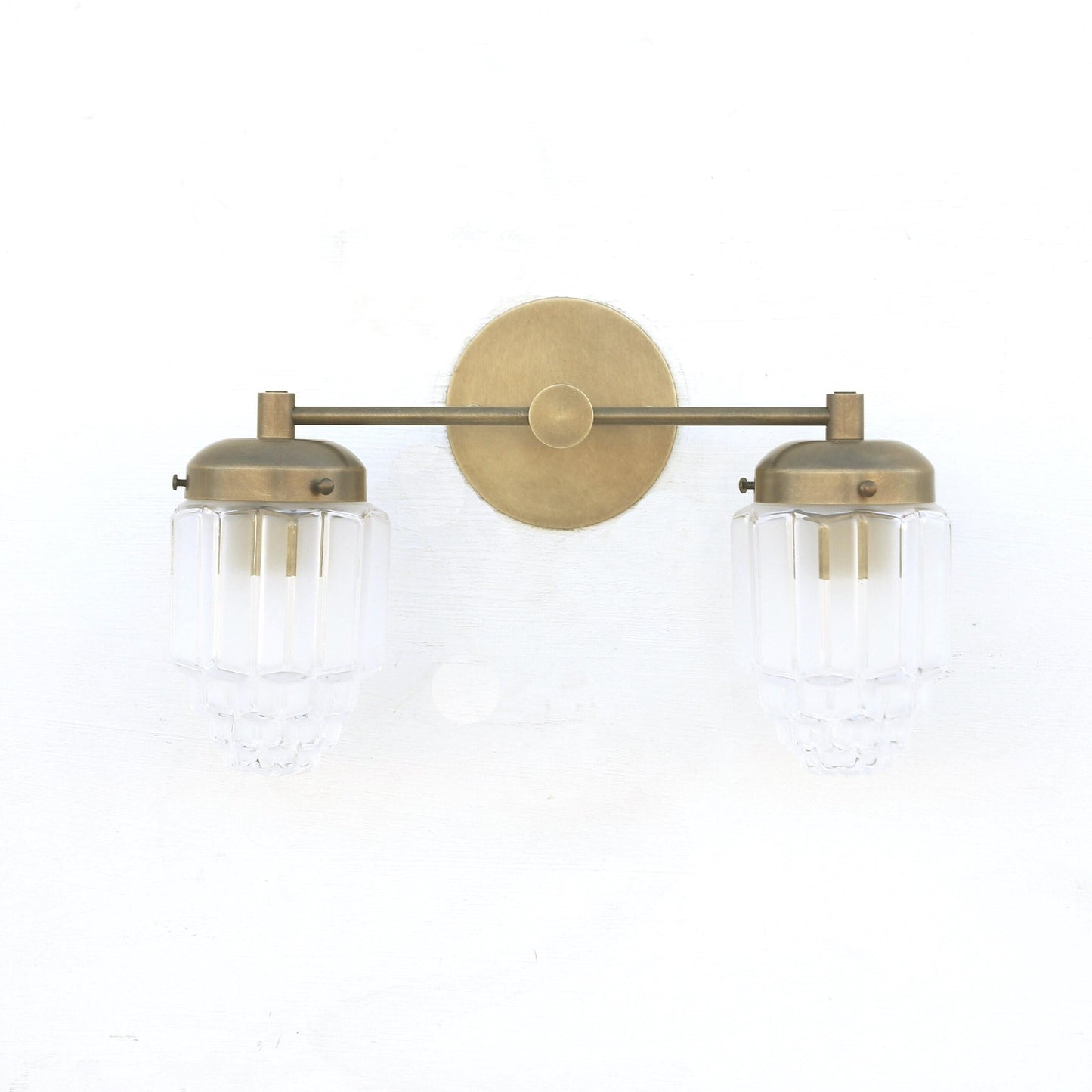 Two-Light Brass Vanity Sconce with Fluted Glass Shades