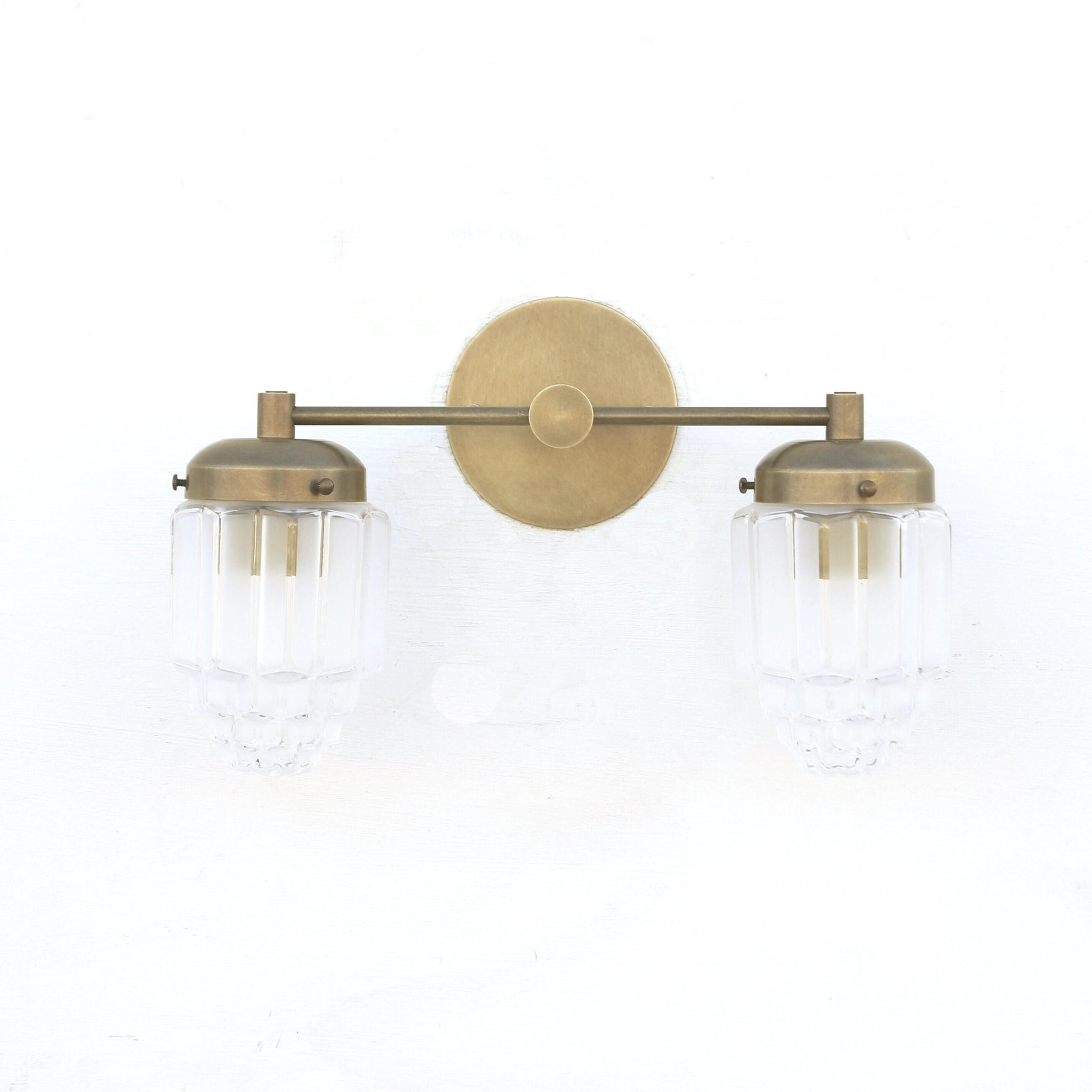 Two-Light Brass Vanity Sconce with Fluted Glass Shades