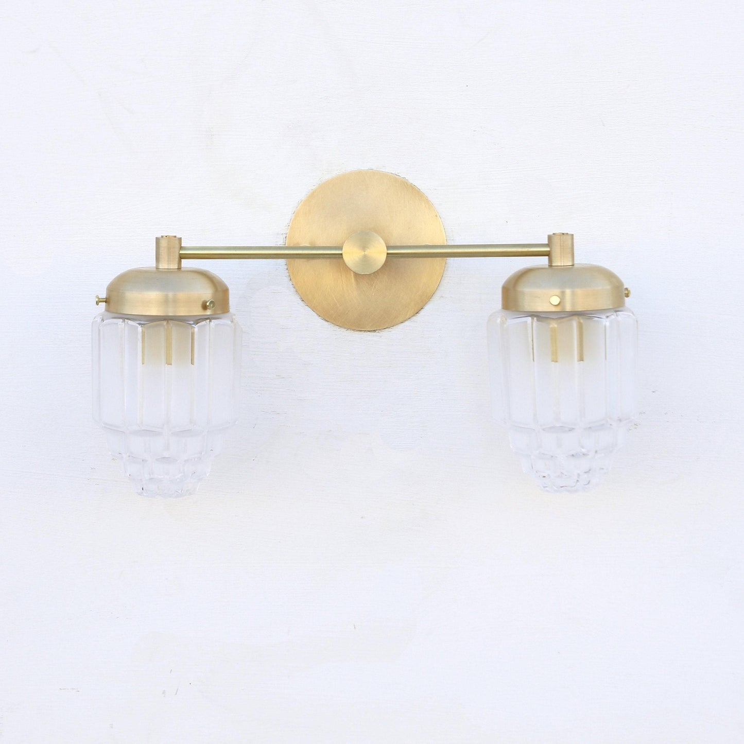 Two-Light Brass Vanity Sconce with Fluted Glass Shades