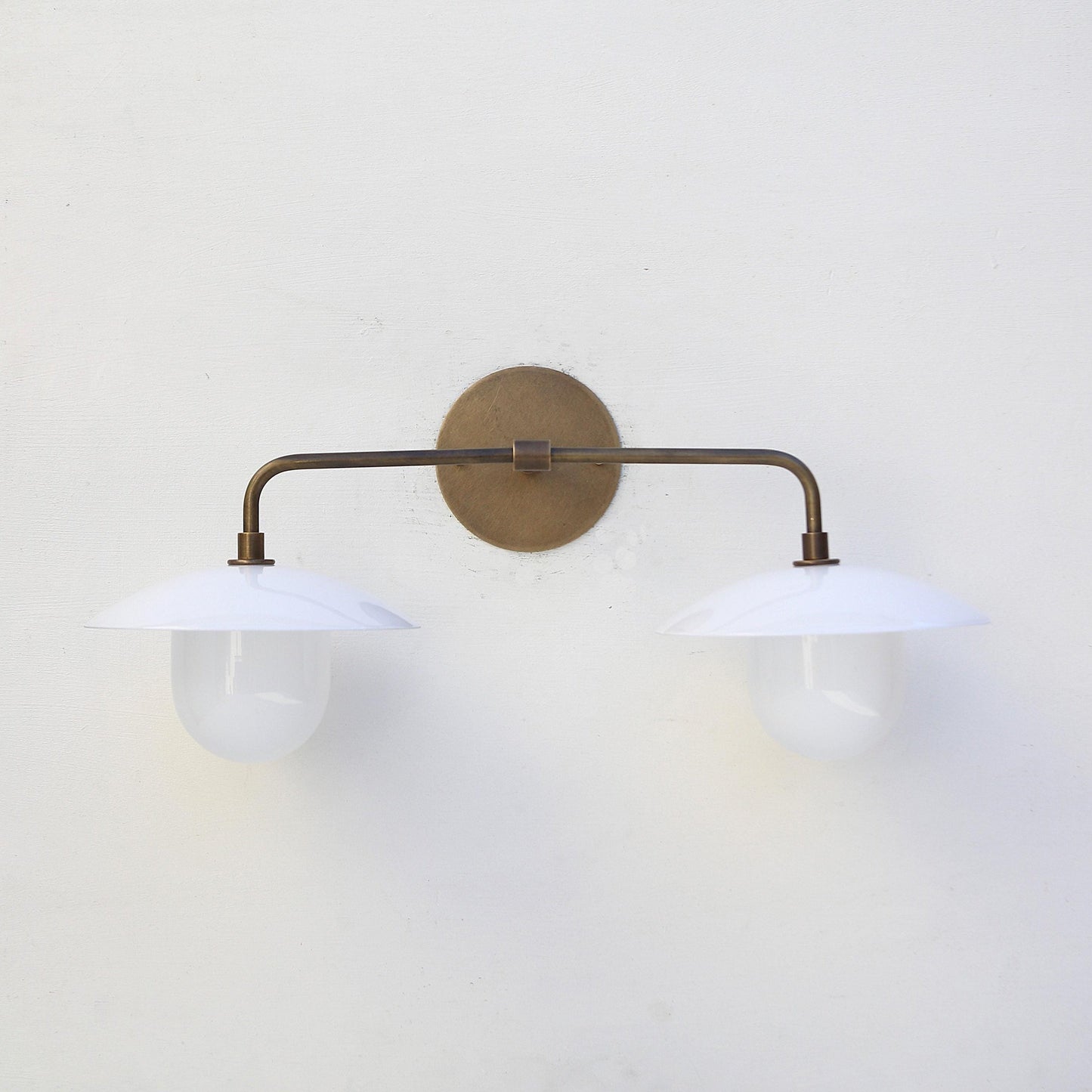 Two-Light Brass Wall Sconce with 8-Inch Opal Glass Cone Shades