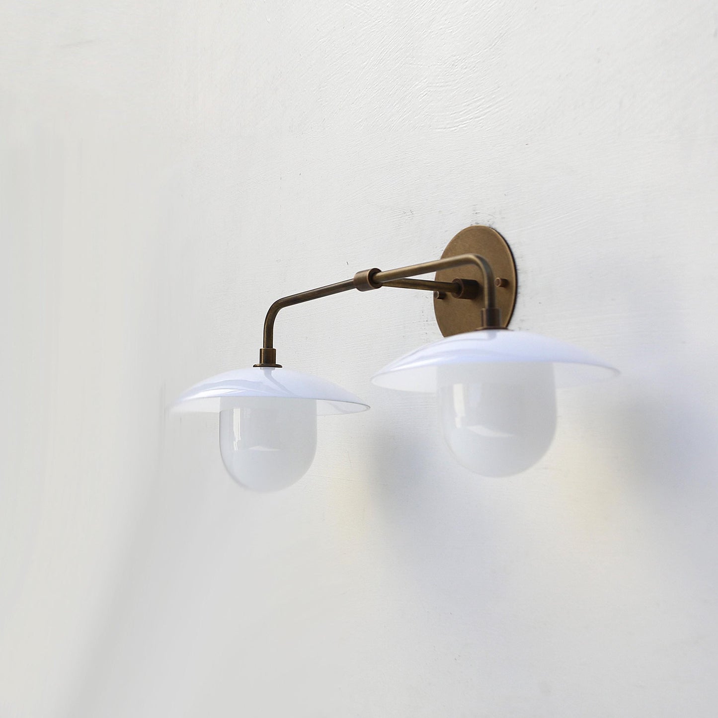 Two-Light Brass Wall Sconce with 8-Inch Opal Glass Cone Shades